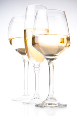 Three glasses of white wine