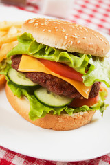 Classic hamburger with cheese, tomato and lettuce