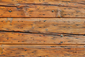 Fototapeta premium old door with a striped surface, wooden background