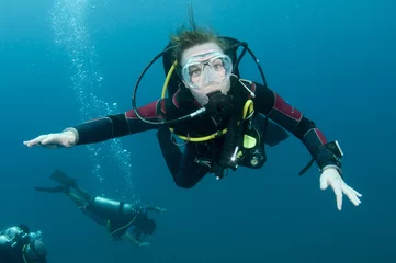 Fotobehang female scuba diver © JonMilnes