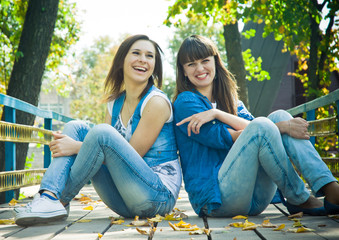 Two girls laughing