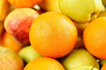 Tasty fresh oranges and green apples