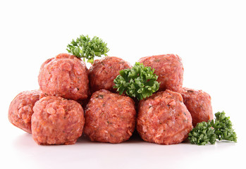 isolated raw meatballs