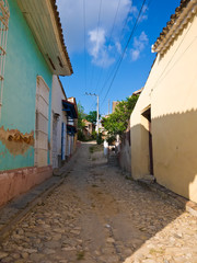 Narrow cobbled street in the colonial town of Trinidad in Cuba