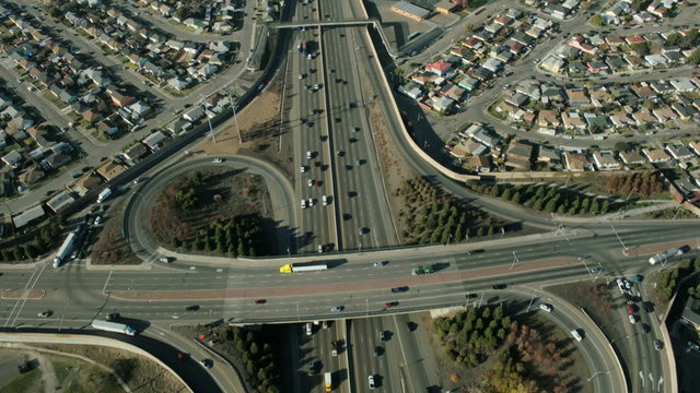 Aerial view of suburban traffic on a busy freeway