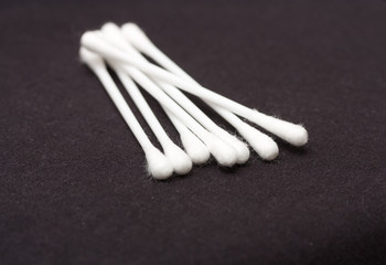 Cotton sticks isolated on black background