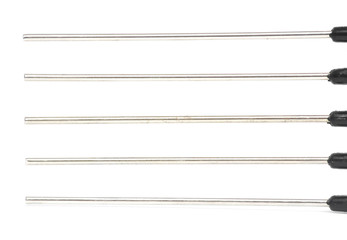 Metal teeth of the comb close