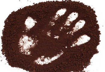 handprint on the background of coffee