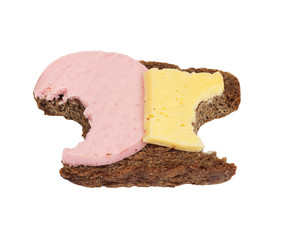 Bitten black bread with cheese and sausage