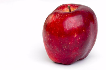 Juicy red apple on white