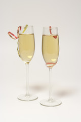 Two glasses of champagne with tape