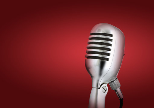 Retro style microphone.Red background