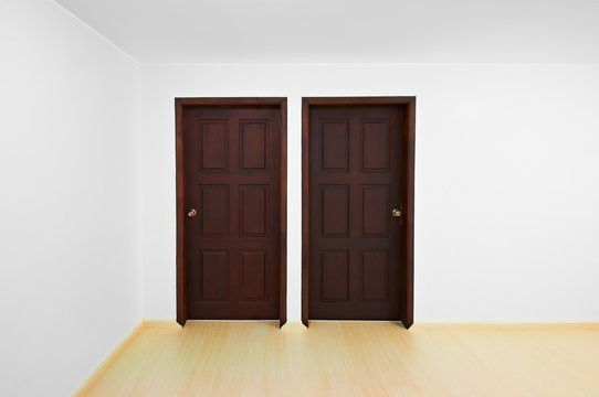 Decision time concept: Room with two doors, each one is a diffe