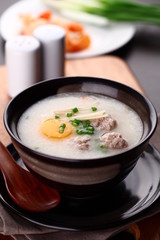 Traditional chinese porridge rice gruel in bowl, congee