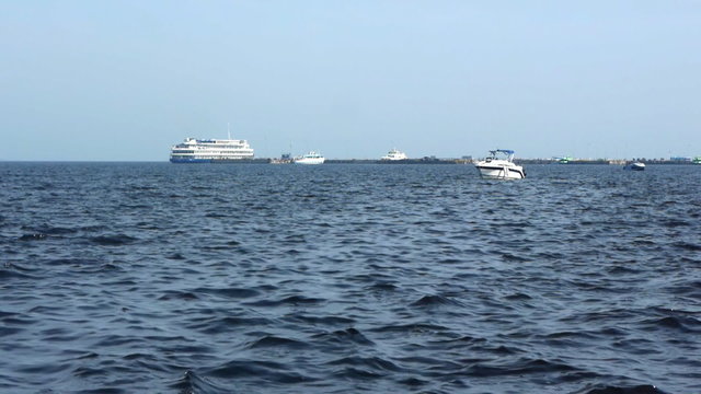 Sailboat in regatta on blue sea