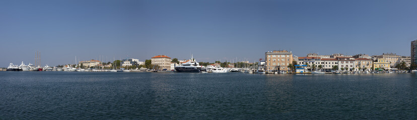 Fototapeta na wymiar apartments and Yachts line Zadar waterway