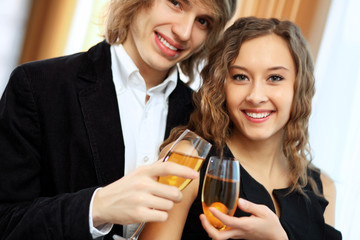 Couple in a restaurant with shampagne