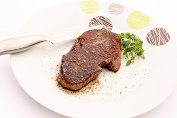 Beefsteak et son couteau