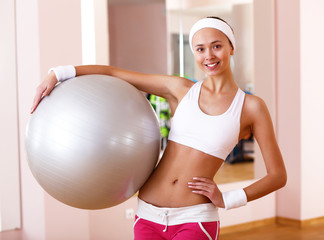 Young woman doing sport in gym