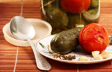 pickled tomatoes and cucumbers