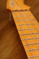 Close up of wooden guitar handle