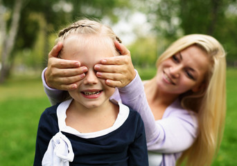 Mother and daughter in park