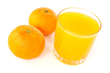 mandarines and juice glass