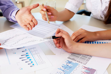 financial and business documents on the table