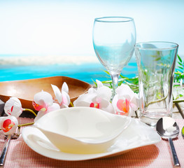 Stylish place setting with orchids