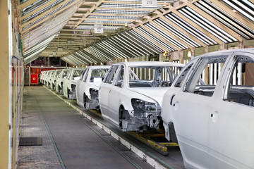 cars in a row at car plant