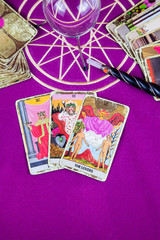 Tarot cards with a magic ball and a magic wand.