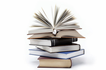 A stack of books on a white background.
