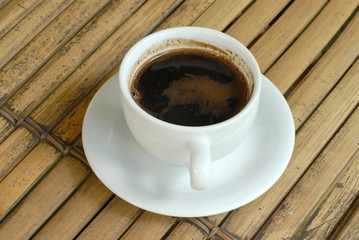 White coffee cups in texture of table.