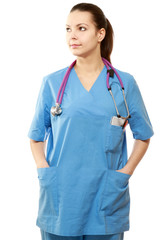 Young nurse standing  over white background