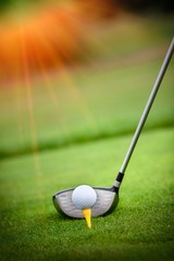 Macro shot of a golf club ready to drive the ball