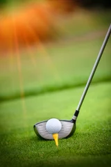 Schilderijen op glas Macro shot of a golf club ready to drive the ball © pitrs