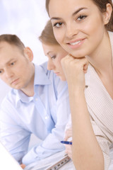 Group of happy business colleagues in a meeting together