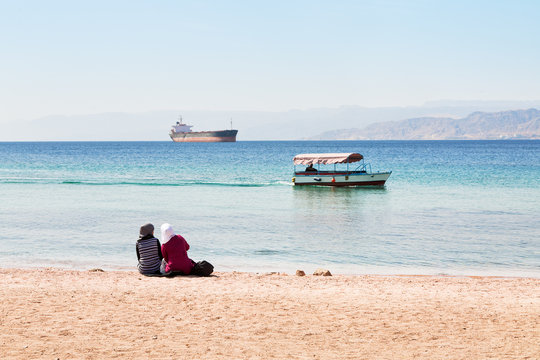 people on urban beach in Aqaba town