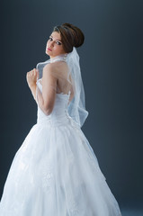 Fototapeta na wymiar Beautiful bride in studio shooting