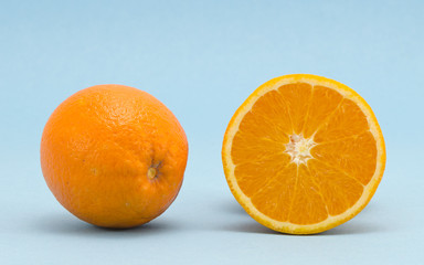 Orange healthy nutrition fruits  blue background