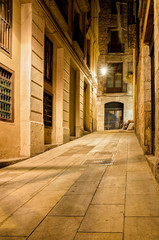 Fototapeta na wymiar nightly lane in gothic quarter, Barcelona, Spain