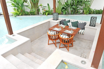 Dinning table in swimming pool