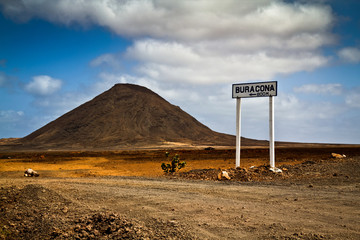 View of a street sign and a mountain in the Cape Verde islands.