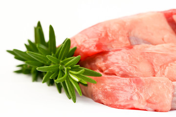 three beef fillet steaks with rosemary