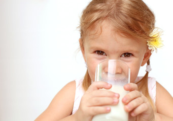 child with a glass of milk