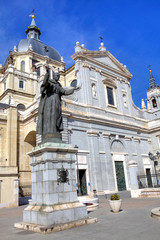 Fototapeta na wymiar Statue of pope John Paul II in front of Almudena Cathedral