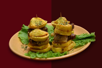 Meat fried with a potato