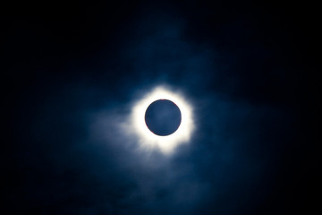 Total solar eclipse with visible corona - obrazy, fototapety, plakaty