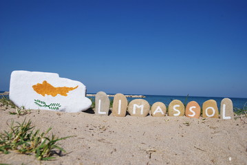 Limassol, Cyprus on stones with sand background