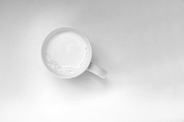 frothy milk in a cup